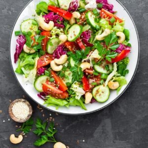 Vegetable salad. Fresh salad with vegetables and nuts