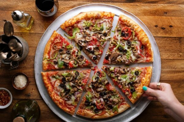 Vegetarian pizza with vegetables and mushrooms